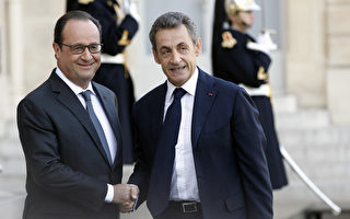 圖為2015年11月15日，巴黎發生恐襲事件的第三天，奧朗德於愛麗捨宮接待前總統薩科齊。（Thierry Chesnot/Getty Images）