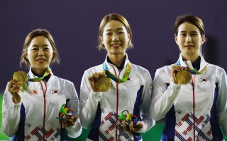 韩国女子射箭队8连冠 教练透露训练秘诀