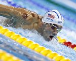 USA's Michael Phelps competes in a Men's 200m Butterfly heat during the swimming event at the Rio 2016 Olympic Games at the Olympic Aquatics Stadium in Rio de Janeiro on August 8, 2016.   / AFP / Odd Andersen        (Photo credit should read ODD ANDERSEN/AFP/Getty Images)