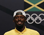 Usain Bolt smiles during a Jamaican Olympic Association and Puma press conference at the Cidade Das Artes in Rio de Janeiro on August 8, 2016.  / AFP / Adrian DENNIS        (Photo credit should read ADRIAN DENNIS/AFP/Getty Images)