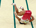 8月14日，41歲的烏茲別克斯坦體操運動員奧克薩娜·丘索維金娜(Oksana Chusovitina)在奧運決賽中選做一個被稱為「死亡之跳」的動作，結果並未成功完成。（Patrick Smith/Getty Images)