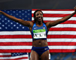 RIO DE JANEIRO, BRAZIL - AUGUST 17:  Nia Ali of the United States poses with the American flag after winning the silver medal in the Women's 100m Hurdles Final on Day 12 of the Rio 2016 Olympic Games at the Olympic Stadium on August 17, 2016 in Rio de Janeiro, Brazil.  (Photo by Shaun Botterill/Getty Images)