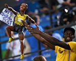 「牙買加閃電」博爾特是世界上跑最快的人。(JOHANNES EISELE/AFP/Getty Images)
