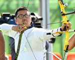 RIO DE JANEIRO, BRAZIL - AUGUST 05: Woojin Kim of Korea competes during the Men's Individual Ranking Round on Day 0 of the Rio 2016 Olympic Games at the Sambodromo Olympic Archery venue on August 5, 2016 in Rio de Janeiro, Brazil.  (Photo by Quinn Rooney/Getty Images)