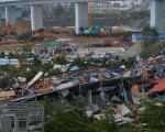 强台莫兰蒂15日在福建厦门沿海登陆，造成灾情。(STR/AFP)