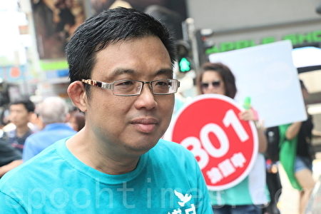 涂謹申相信隨著3名泛民候選人棄選,選票重新分配後,泛民能在超區保住三席,他又表示很尊敬3人棄選的決定。(孫青天/大紀元)