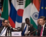 2016年9月4日习近平和奥巴马在杭州G20峰会开幕式上。(Nicolas Asfouri - Pool/Getty Images)