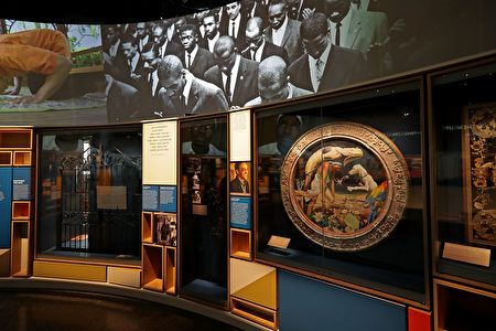 WASHINGTON, DC - SEPTEMBER 14: A mix of video screens, printed information, sculpture and other artifacts fill the first space the fourth floor's Culture Galleries at the Smithsonian's National Museum of African American History and Culture on the National Mall September 14, 2016 in Washington, DC. Filled with exhibits and artifacts telling the story of the first Africans in the United States and their descendents, the 400,000-square-foot museum will open to the public on September 24. (Photo by Chip Somodevilla/Getty Images)