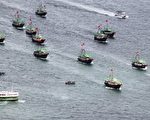因非法捞捕在全球饱受诟病的中国渔船,因撞沉韩国海警快艇，惹怒韩国社会欲以“炮轰”对应。(LAURENT FIEVET/AFP/GettyImages)
