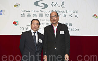左起：银基集团财务总监王晋东、银基集团主席梁国兴。（余钢／大纪元）