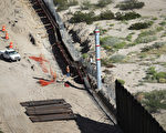 候任總統川普表示，美墨邊境的牆還是要建的，但接受一些地方建圍欄。 (John Moore/Getty Images)