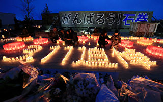 2011年3月11日，日本東北部海域發生9級大地震，並引發大海嘯，造成至少15,894人死亡、2,557人失蹤、傷者6,152人。(JIJI PRESS/AFP/Getty Images)
