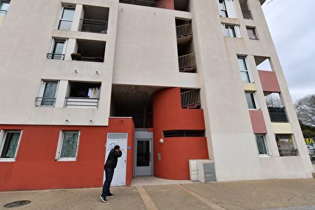 A man takes pictures of a building in Montpellier, southern France, on February 10, 2017, where suspects believed to be involved in plotting an attack were arrested by French anti-terrorist police (RAID). Four people including a 16-year-old girl were arrested on February 10 by anti-terrorist police in Montpellier on suspicion of preparing an attack, a police source said. The other suspects were aged 20, 26 and 33, according to the source. The four were arrested after buying acetone, a highly flammable liquid that can be used to make bombs. France remains on high alert after a wave of attacks which began two years ago that has claimed more than 200 lives. / AFP / PASCAL GUYOT (Photo credit should read PASCAL GUYOT/AFP/Getty Images)