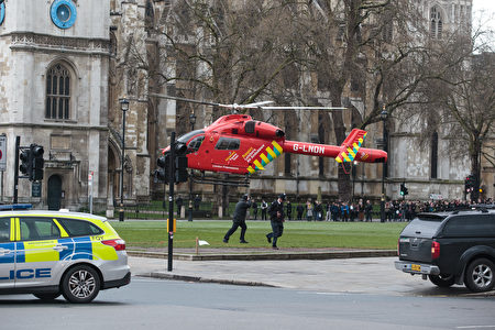 LONDON, ENGLAND - MARCH 22: An Air Ambulance at the scene by Westminster Bridge and the Houses of Parliament on March 22, 2017 in London, England. A police officer has been stabbed near to the British Parliament and the alleged assailant shot by armed police. Scotland Yard report they have been called to an incident on Westminster Bridge where several people have been injured by a car. (Photo by Jack Taylor/Getty Images)