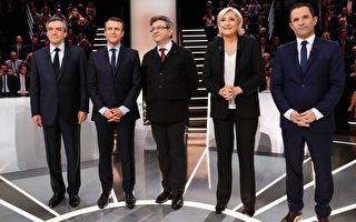 法國首輪總統大選即將在週日（4月23日）舉行，呼聲最高的馬克龍（圖左二）及勒龐（圖右二）民調拉近，近三成選民還不知道要投給誰，選情撲朔迷離。(PATRICK KOVARIK/AFP/Getty Images)