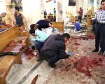 9日，埃及基督徒们正在庆祝棕枝主日之际，两座科普特教堂先后遭炸弹袭击，造成至少36人死亡，95人受伤，场面十分凄惨。(STRINGER/AFP/Getty Images)