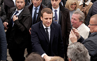 4月23日，法國總統候選人馬克龍在投票站。(Sylvain Lefevre/Getty Images)