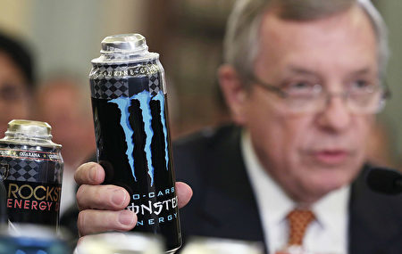 WASHINGTON, DC - JULY 31: U.S. Senate Majority Whip Sen. Richard Durbin (D-IL) holds up a can of Monster energy drink as he testifies during a hearing before the Senate Commerce, Science and Transportation Committee July 31, 2013 on Capitol Hill in Washington, DC. The hearing was to focus on "Energy Drinks: Exploring Concerns About Marketing to Youth." (Photo by Alex Wong/Getty Images)