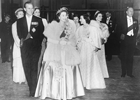HM Queen Elizabeth II and Prince Philip, the Duke of Edinburgh, wearing formal dress as they attend a concert at Festival Hall, London, May 1951. (Photo by Hulton Archive/Getty Images)