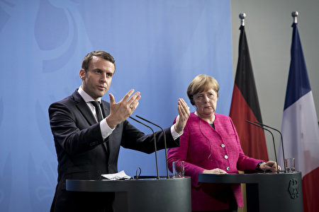 BERLIN, GERMANY - MAY 15: German Chancellor Angela Merkel and newly-elected French President Emmanuel Macron attend a press conference at the Chancellery on May 15, 2017 in Berlin, Germany. Macron is visiting Berlin only a day after being sworn in as president in Paris. While Macron and Merkel have both demonstrated an unwavering commitment to the European Union and Merkel strongly applauded Macron's election, they are likely to differ over Macron's desire for E.U.-issued bonds, a measure Merkel has strongly opposed in the past. (Photo by Axel Schmidt/Getty Images)