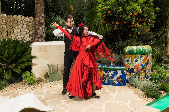 LONDON, ENGLAND - MAY 22: Traditional Spanish flamenco dancers perform at the RHS Chelsea Flower Show on May 22, 2017 in London, United Kingdom. Created by multi award winning designer, Sarah Eberle, the garden was inspired by the art, architecture and colours of Barcelona, one of Viking Cruises' most popular destinations. (Photo by Ian Gavan/Getty Images for Viking Cruises)