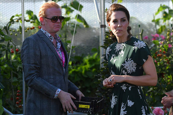 LONDON, ENGLAND - MAY 22: BBC Radio 2 presenter Chris Evans (L) watches as Catherine, Duchess of Cambridge, samples a tomato at the 'BBC Radio 2: Chris Evans Taste Garden' during her visit the RHS Chelsea Flower Show press day at Royal Hospital Chelsea on May 22, 2017 in London, England. The prestigious Chelsea Flower Show, held annually since 1913 in the Royal Hospital Chelsea grounds, is open to the public from the 23rd to the 27th of May, 2017. (Photo by Ben Stansall - WPA Pool / Getty Images)