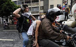 組圖：委內瑞拉反總統抗議持續 17歲少年身亡
