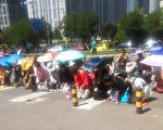与警打游击 近千E租宝受害人进京讨血汗钱
