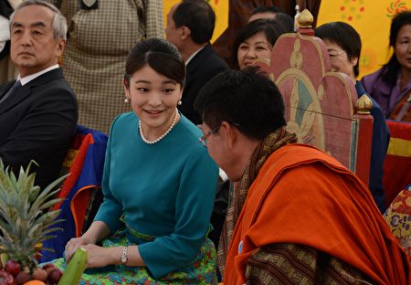 Japanese Princess Mako (L) speaks with Bhutanese Minister of Foreign affairs Lyonpo Damcho Dorji ahead of the opening ceremony for 'Japan Week' at the Clock Tower in Thimpu on June 2, 2017. Japanese Princess Mako, the oldest of Emperor Akihito's grandchildren, is on a nine-day official visit to Bhutan. / AFP PHOTO / DIPTENDU DUTTA (Photo credit should read DIPTENDU DUTTA/AFP/Getty Images)