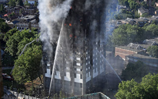 英國倫敦24層公寓大樓今年6月被大火吞噬，釀成至少80人死亡。(Leon Neal/Getty Images)