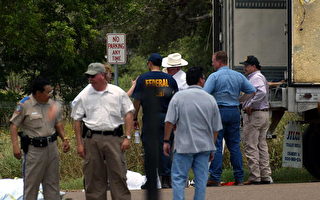 VICTORIA, TEXAS - MAY 14:  City and state discuss the deceased illegal immigrants found May 14, 2003 in Victoria, Texas.  The bodies of 18 immigrant were discovered in and around an 18-wheel truck in the early morning hours May 14 by a truck stop.  (Photo by Kerri L. Spires/Getty Images)
