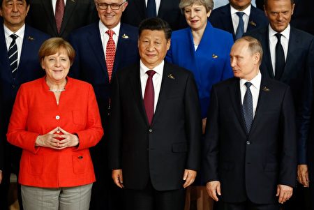 各國領導人在G20會議上照全家福。( Thomas Lohnes/Getty Images)