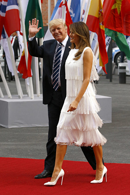 7月7日，川普與梅拉尼婭夫婦出席為G20領袖及夫人在漢堡舉行的晚宴和交響音樂會。(Morris MacMatzen/Getty Images)