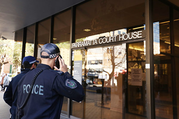 SYDNEY, AUSTRALIA - AUGUST 04: Police officers are seen at Parramatta Court on August 4, 2017 in Sydney, Australia. Mahmoud Khayat, 32, and Khaled Mahmoud Khayat, 49, were arrested by counter-terrorism police during raids across Sydney on Saturday over an alleged plot that involved blowing up an aircraft. The AFP have charged the two men with two counts of acting in preparation for or planning a terrorist act. (Photo by Mark Metcalfe/Getty Images)