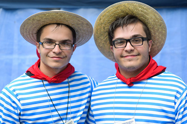 Samuel Muscatto, left, and identical twin brother Joseph, both 18 from Buffalo, pose for a portrait during the Twins Days Festival in Twinsburg, Ohio, on August 5, 2017. The Twins Days Festival is the world's largest gathering of twins and multiples and celebrates its 42nd year. / AFP PHOTO / Dustin Franz (Photo credit should read DUSTIN FRANZ/AFP/Getty Images)