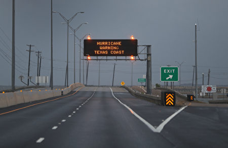 CORPUS CHRISTI, TX - AUGUST 25: A road sign warns travelers of the the approaching Hurricane Harvey on August 25, 2017 in Corpus Christi, Texas. Hurricane Harvey has intensified into a hurricane and is aiming for the Texas coast with the potential for up to 3 feet of rain and 125 mph winds. (Photo by Joe Raedle/Getty Images)