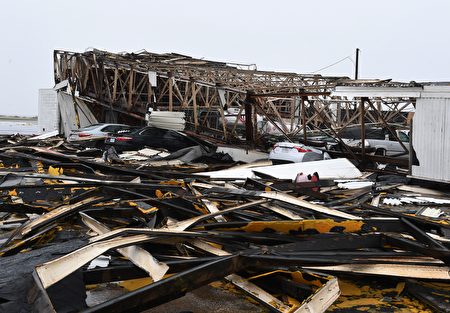 A destroyed building at Rockport Airport after heavy damage when Hurricane Harvey hit Rockport, Texas on August 26, 2017. Hurricane Harvey left a trail of devastation Saturday after the most powerful storm to hit the US mainland in over a decade slammed into Texas, destroying homes, severing power supplies and forcing tens of thousands of residents to flee. / AFP PHOTO / MARK RALSTON (Photo credit should read MARK RALSTON/AFP/Getty Images)