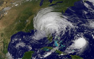 2017年9月11日卫星图像显示飓风Jose（下右）和热带风暴艾玛（中）。（AFP PHOTO / NASA/GOES Project）