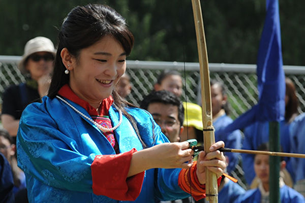 Japan's Princess Mako prepares to shoot an arrow at the Changlingmethang National Archery ground in Thimphu on June 3, 2017. Japan's Princess Mako, the oldest of Emperor Akihito's grandchildren, is on a nine-day official visit to Bhutan. / AFP PHOTO / Diptendu DUTTA (Photo credit should read DIPTENDU DUTTA/AFP/Getty Images)
