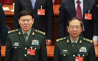 傳房峰輝（右）和張陽（左）正在接受調查。（Lintao Zhang/Getty Images））