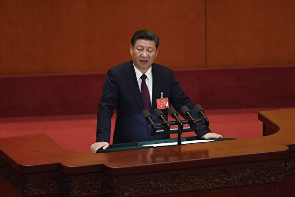 十九大18日召开，中国最高领导人习近平在开幕式上发表工作报告，罕见地把“民主”摆在第一位。（AFP）