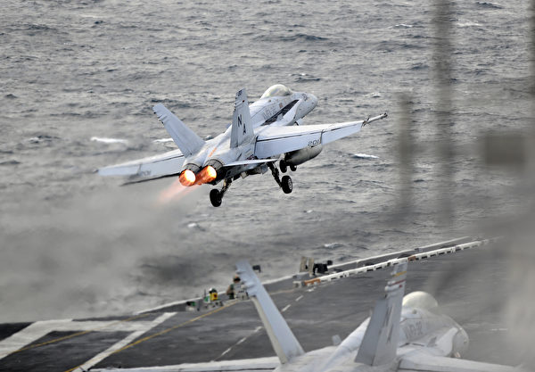 171111-N-KB563-1237 PACIFIC OCEAN (Nov. 11, 2017) An F/A-18E Super Hornet, assigned to the Stingers of Strike Fighter Attack Squadron (VFA) 113, launches from the flight deck of the aircraft carrier USS Theodore Roosevelt (CVN 71) in the western Pacific Ocean. Aircraft carriers, Theodore Roosevelt, Ronald Reagan, and Nimitz strike groups are underway conducting flight operations in international waters as part of a three-carrier strike force exercise. The U.S. Pacific Fleet has patrolled the Indo-Pacific region routinely for more than 70 years promoting regional security, stability and prosperity. (U.S. Navy photo by Mass Communication Specialist 1st Class Michael Russell/Released)