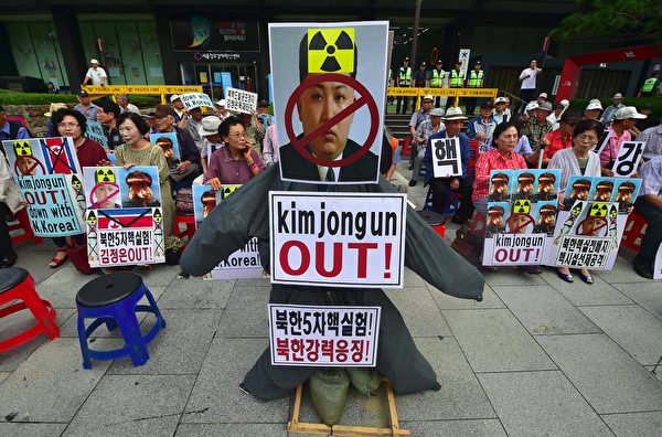 去年9月韓國民眾抗議朝鮮核試驗。 (Photo credit should read JUNG YEON-JE/AFP/Getty Images)