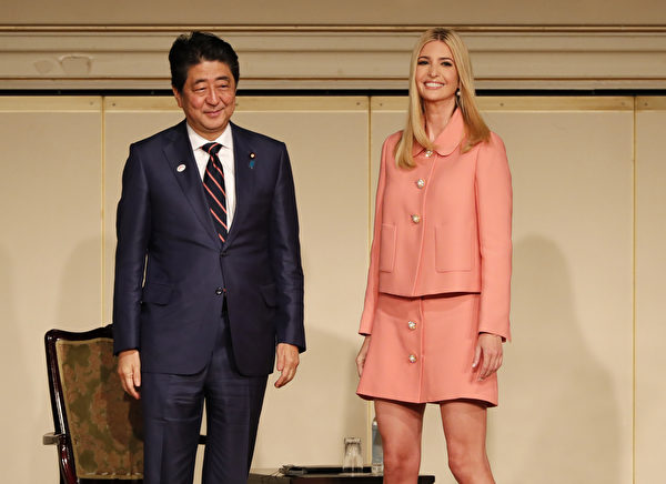 Ivanka Trump (R), advisor to US President Donald Trump, and Japan's Prime Minister Shinzo Abe attend a meeting of the World Assembly for Women (WAW!) in Tokyo on November 3, 2017. Ivanka Trump is to speak at the World Assembly for Women in the Japanese capital ahead of her father's presidential visit. / AFP PHOTO / POOL / KIM KYUNG-HOON (Photo credit should read KIM KYUNG-HOON/AFP/Getty Images)
