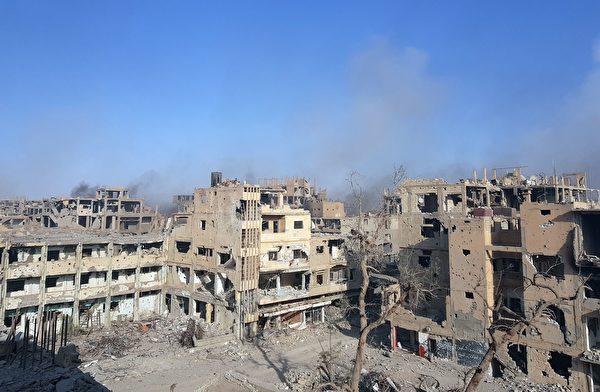 敘利亞政府軍週五也宣布，已收復伊斯蘭國的最後主要據點、東部大城代爾祖爾市（Deir al-Zor）。(STRINGER/AFP/Getty Images)