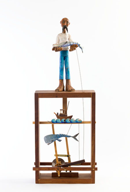 展品通過木頭和繩線的傳送，使木偶進行活動。（主辦方提供）