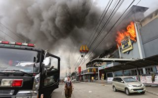 菲商场大火烧一天一夜 至少37人生死未卜
