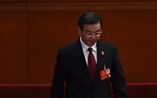 Zhou Qiang, President of the Supreme People's Court, is applauded as he walks out to deliver his work report during the third plenary session of the National People's Congress in the Great Hall of the People in Beijing on March 13, 2016. China found almost 100 percent of criminal defendants guilty last year, figures from the country's top court showed on March 13, even as authorities pledged to reduce wrongful convictions. / AFP / GREG BAKER (Photo credit should read GREG BAKER/AFP/Getty Images)
