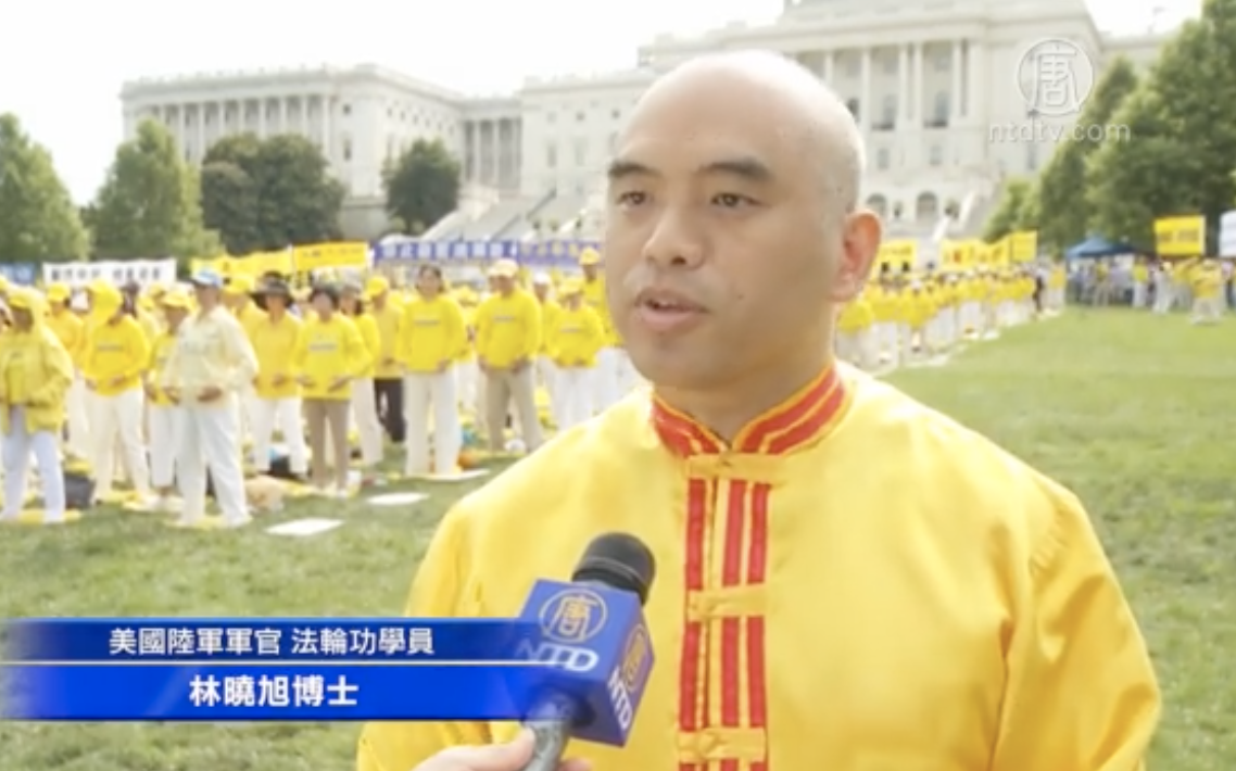 6月20日,在美國國會山集會間林曉旭博士接受新唐人採訪。(大紀元視頻截圖)