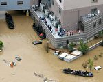 日本暴雨已致逾百人死亡 安倍取消外訪